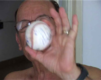 Vasilios proudly sports his Olympic trophy: a signed Olympic baseball