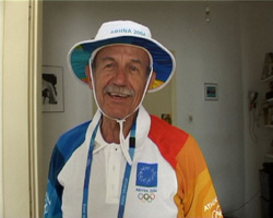 a still from Olmpic Diaries: Vasilios wearing his Athens 2004 volunteer uniform