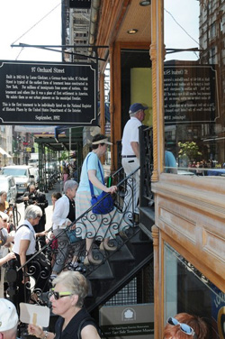 visitors entering the Tenement Museum at 97 Orchard Street